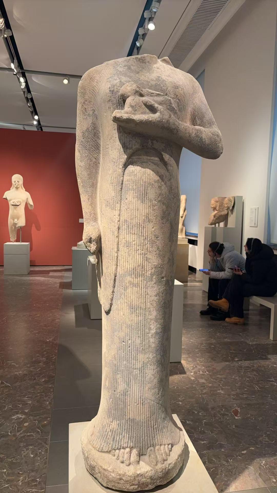 Statue of a Woman Holding a Rabbit (Votive Offering)