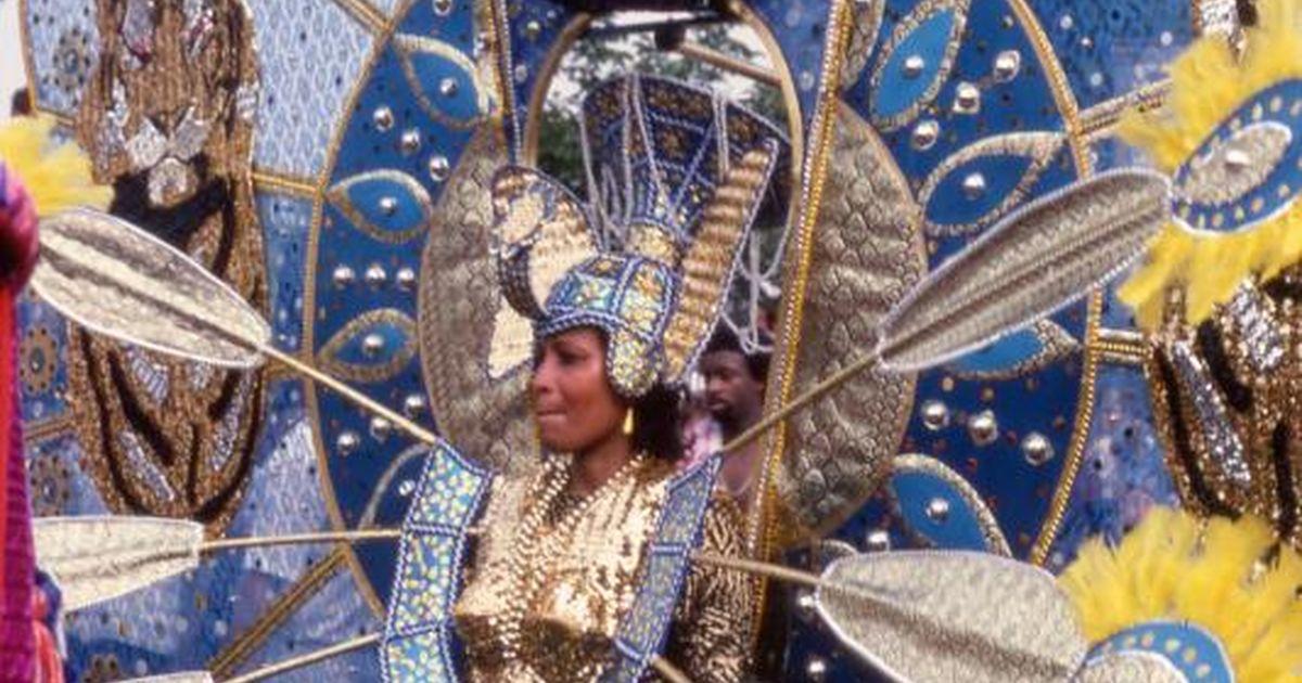 Colour transparency; Woman in a tiger head costume at the 1984 Notting Hill Carnival