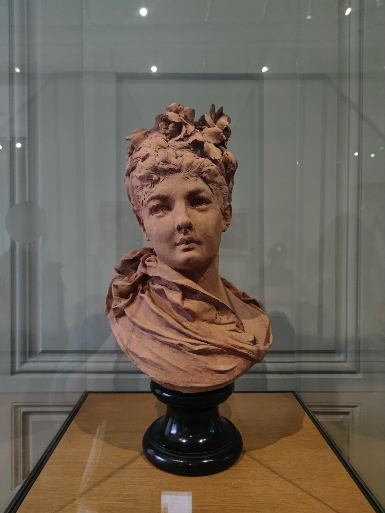 Bust of Young Woman with Roses in Her Hair